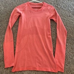 Salmon colored Lululemon Swiftly Long Sleeve